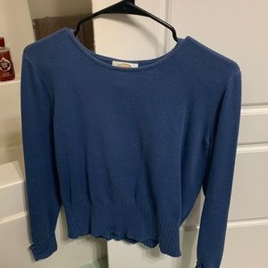 this is a cute sweater. barley worn.